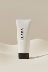 ELARA Daily Glow Face Wash matte white tube side angle
