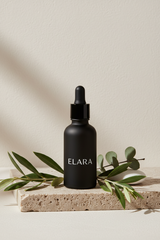 ELARA Ceramide Repair Serum matte black dropper bottle side view